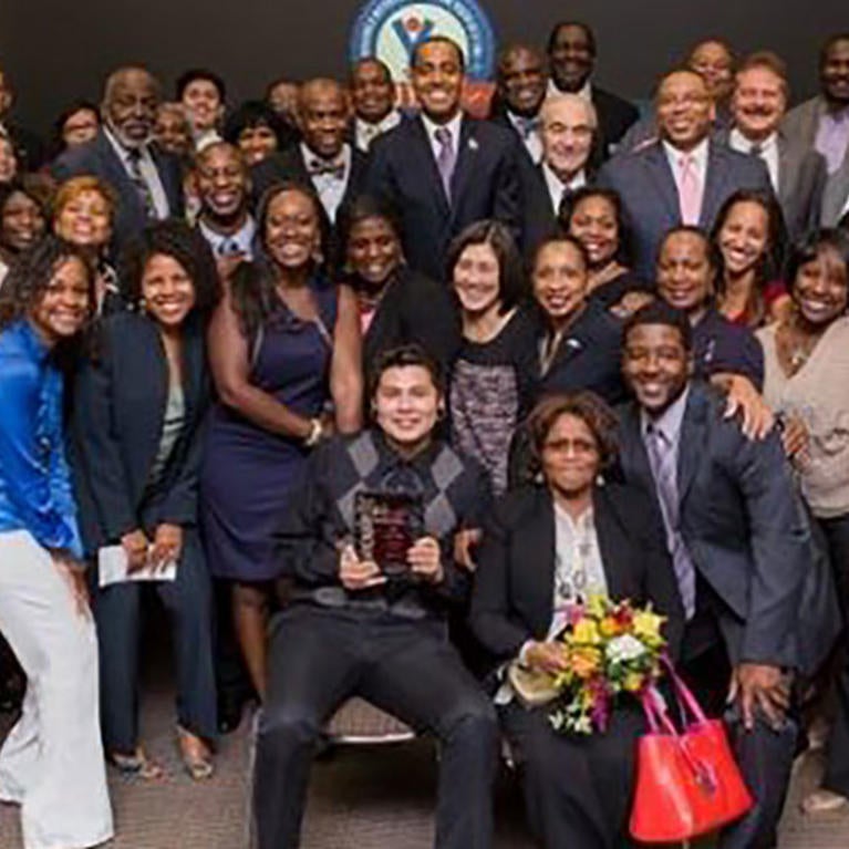 Group Picture of an award ceremony by Black Voice News