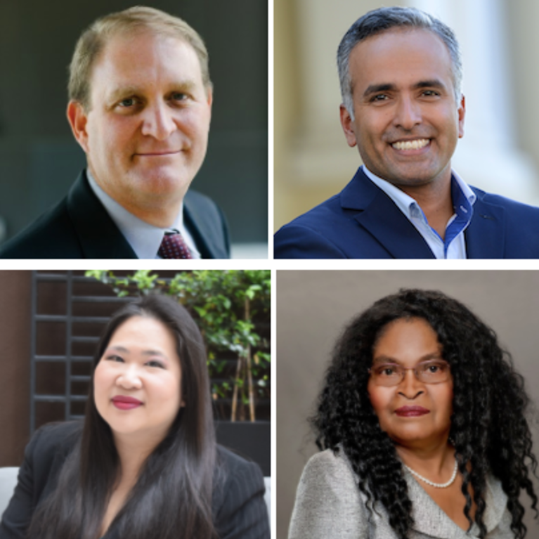 Photo of 4 speakers on the article