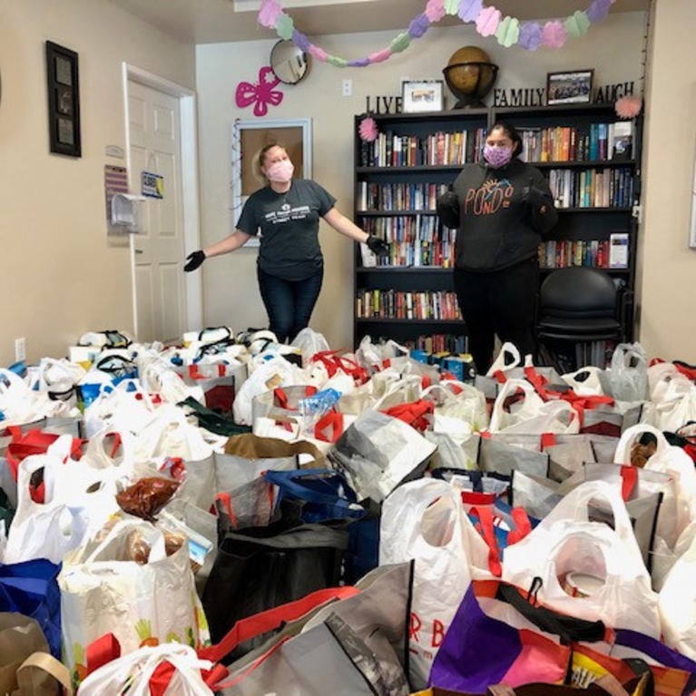 Staff of National CORE prepare groceries for distribution to homebound seniors. (Courtesy of CORE)