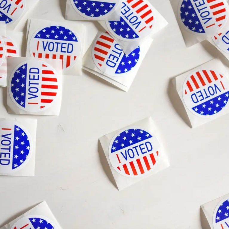 photo from Pexels.com https://www.pexels.com/photo/stickers-with-i-voted-inscription-and-flag-of-usa-1550339/ by Element5 Digital