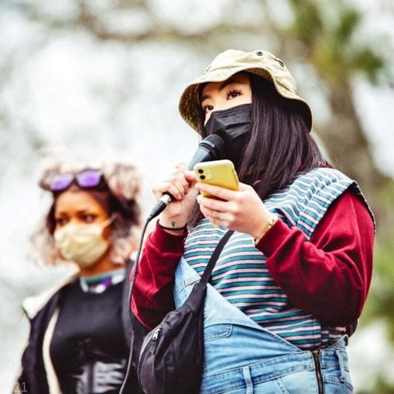 Michigan activists Ceena Vang and Zora Bowens protesting anti-Asian American and Pacific Islander violence and hate after Atlanta spa shootings in 2021.