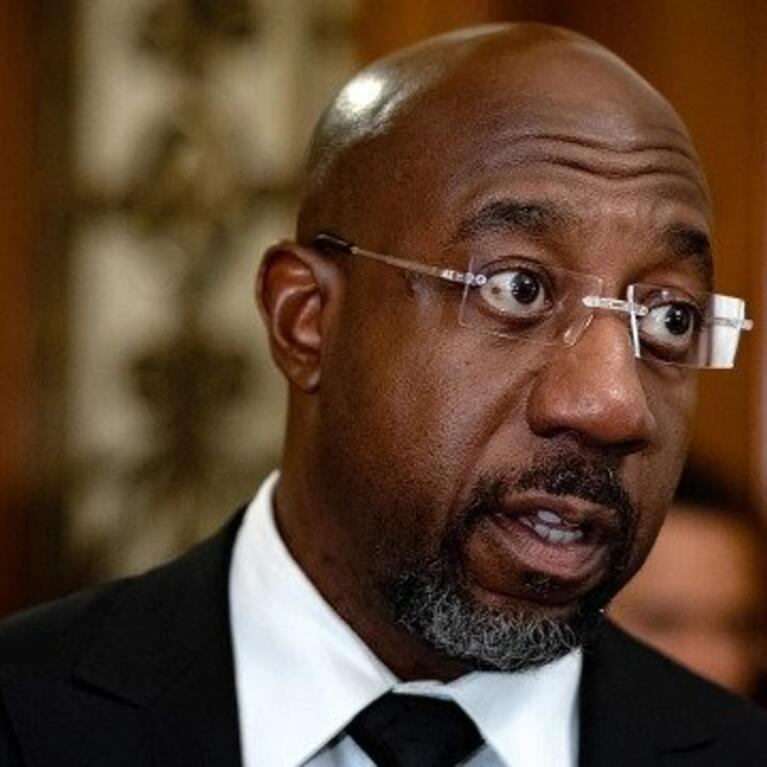 Sen. Raphael Warnock (D-Ga.) addresses reporters after the weekly Senate Democratic policy luncheon on Tuesday, September 20, 2022.