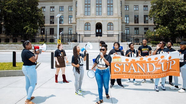 Abortion rights advocates protesting the Supreme Court decision to overturn Roe v. Wade outside the Georgia State Capitol in Atlanta on Friday. Kendrick Brinson for the New York Times