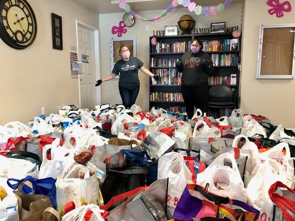 Staff of National CORE prepare groceries for distribution to homebound seniors. (Courtesy of CORE)