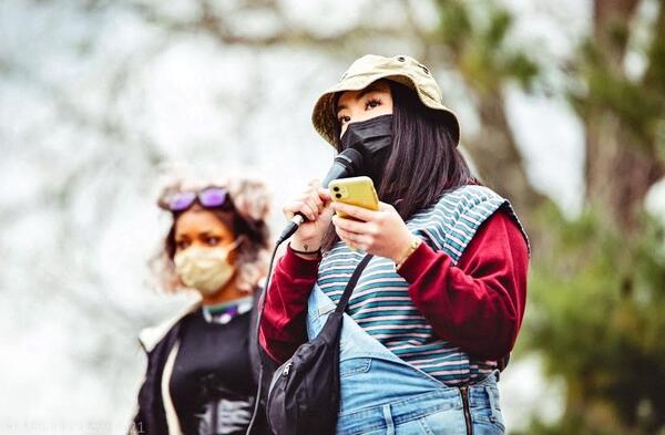 Michigan activists Ceena Vang and Zora Bowens protesting anti-Asian American and Pacific Islander violence and hate after Atlanta spa shootings in 2021.