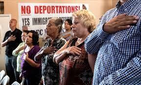 The Pledge of Allegiance is spoken in English, but most of the immigration rights forum was in Spanish at TODEC Legal Center in Perris on Friday, July 5, 2019.