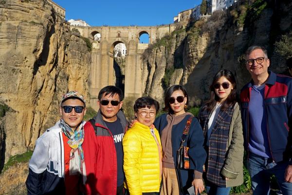 Charlie Gu, far left, and his husband, Thomas Alfieri, far right, with Gu’s family on vacation in Spain. Gu, who lives in San Francisco, uses WeChat for his business and to keep in touch with his family abroad.(Charlie Gu)