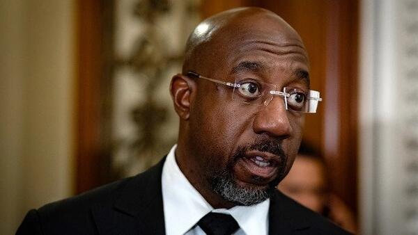 Sen. Raphael Warnock (D-Ga.) addresses reporters after the weekly Senate Democratic policy luncheon on Tuesday, September 20, 2022.