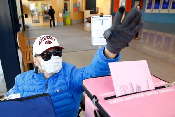 A man casting his ballot on the eve of Super Tuesday, at a voting center in Sacramento in March.Credit...Rich Pedroncelli/Associated Press