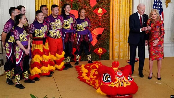President Joe Biden and first lady Jill Biden speak during a reception to celebrate the Lunar New Year in the East Room of the White House in Washington, Jan. 26, 2023.