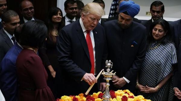 President Trump celebrates Diwali with former Indian ambassador to the US Arun Singh, along with others from the Indian community, at the White House in 2018. (File photo)