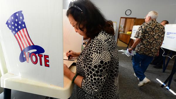 Voters cast ballots in Los Angeles County in California on November 6, 2012. Frederic J. Brown / AFP/Getty Images